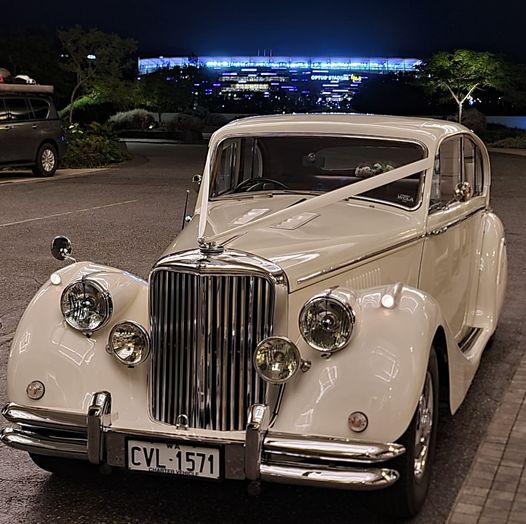 Vintage Jaguar wedding sedan